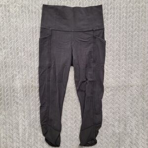 Athleta Leggings Womens Size‎ XS Black Salutation Stash Pocket II Capri